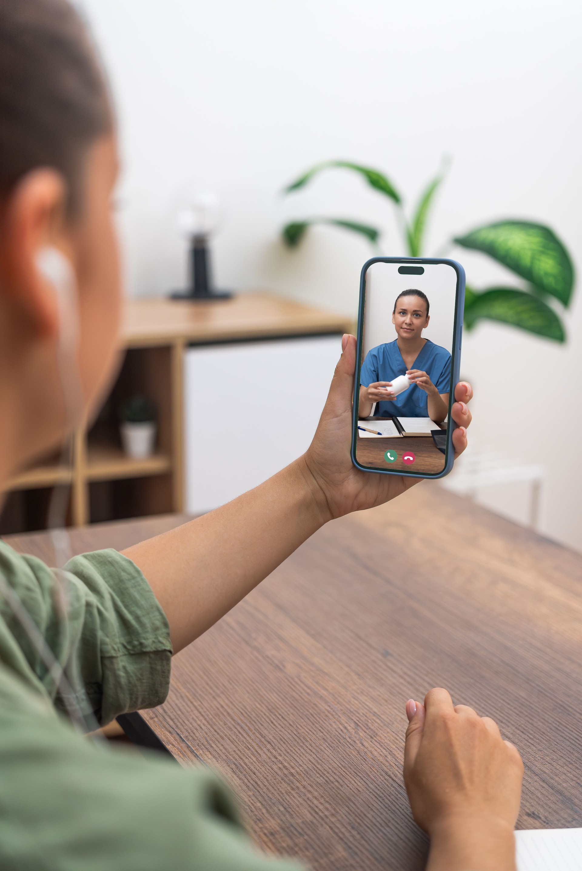 Patient engaging with a healthcare professional via mobile telemedicine service, exemplifying modern remote medical consultations